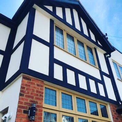 mock tudor board replacement cost.